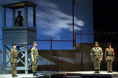 Two Marines in a tense exchange in the courtroom set for A Few Good Men