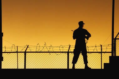 Two Marines in fatigues in a heated confrontation