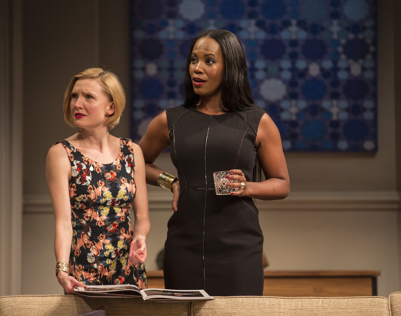 Two women in conversation in the Disgraced living room