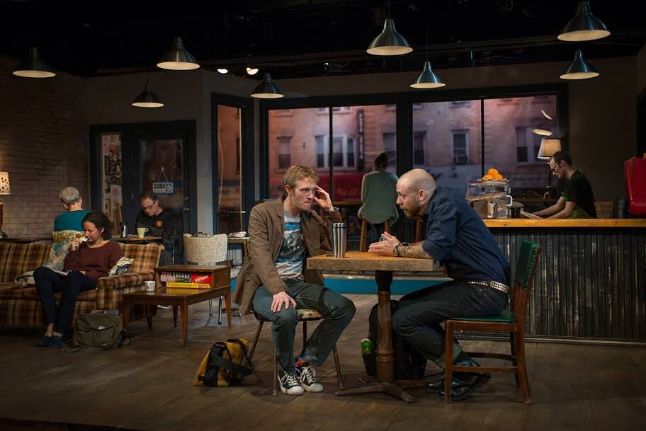 Two men talking over coffee in The Great God Pan