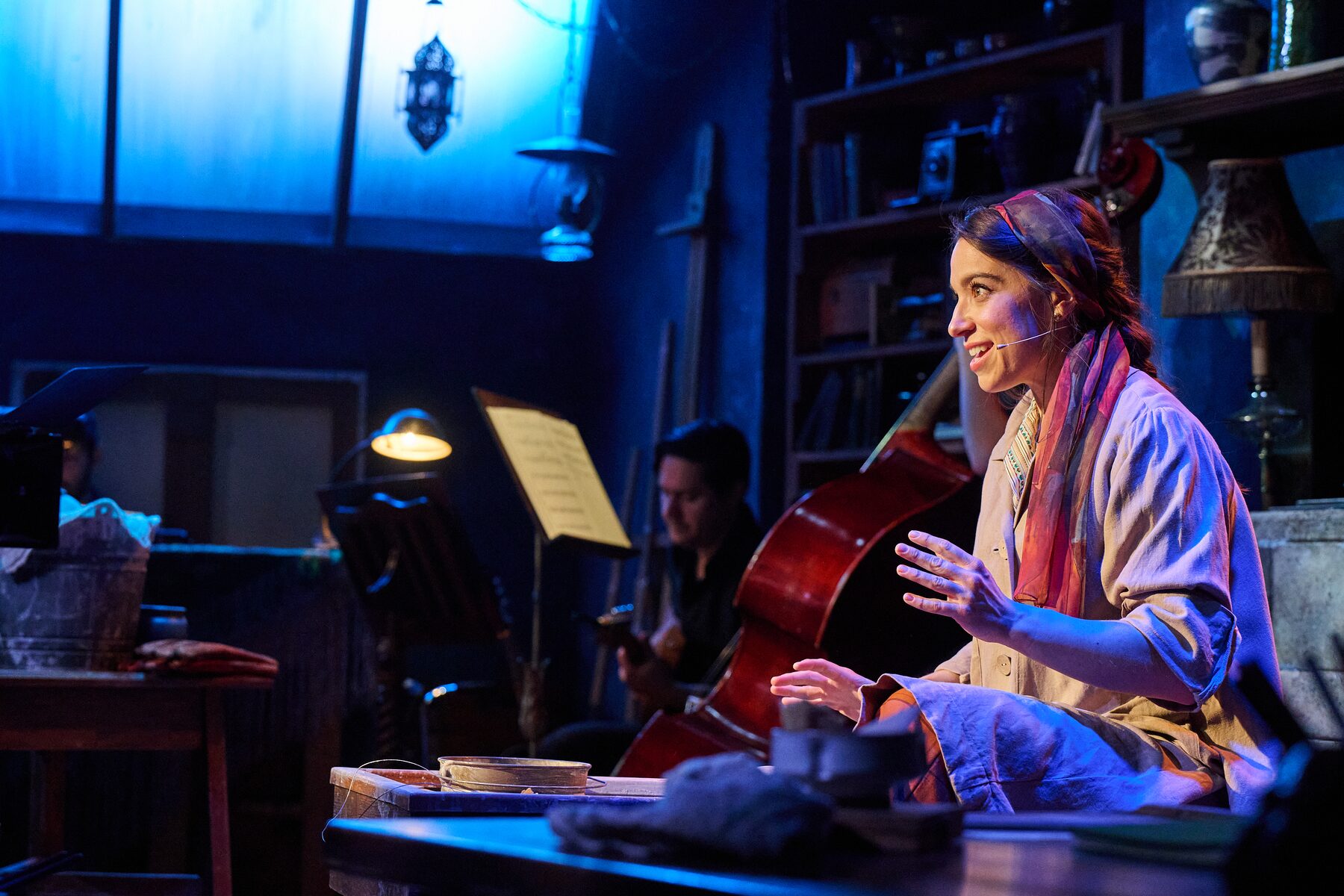 Alex Finke as Marie-Berthe Cazin, mid-song, with the cellist behind her
