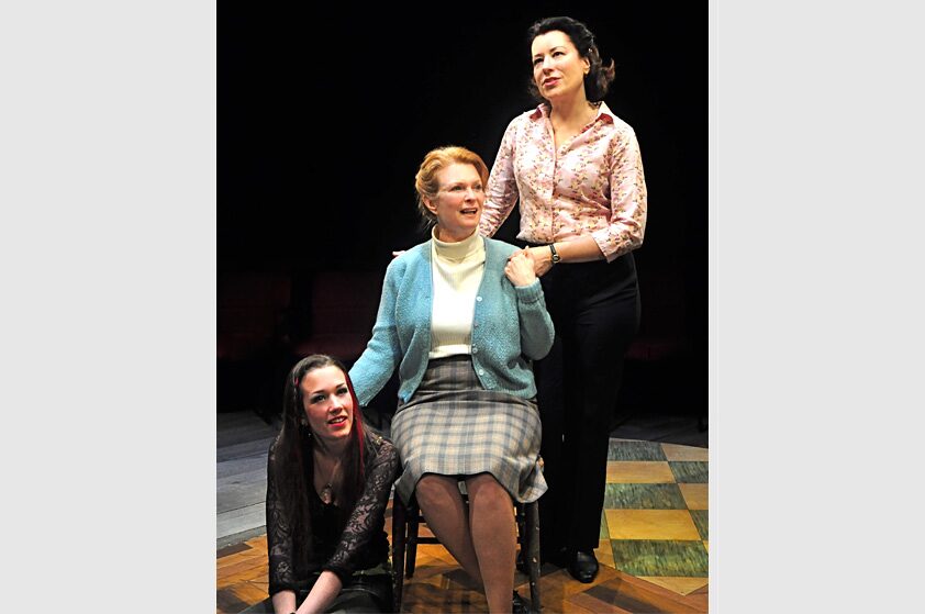 The cast of Little Gem in a tender moment