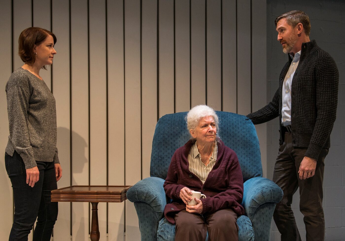 Three actors standing in the living room of Marjorie Prime