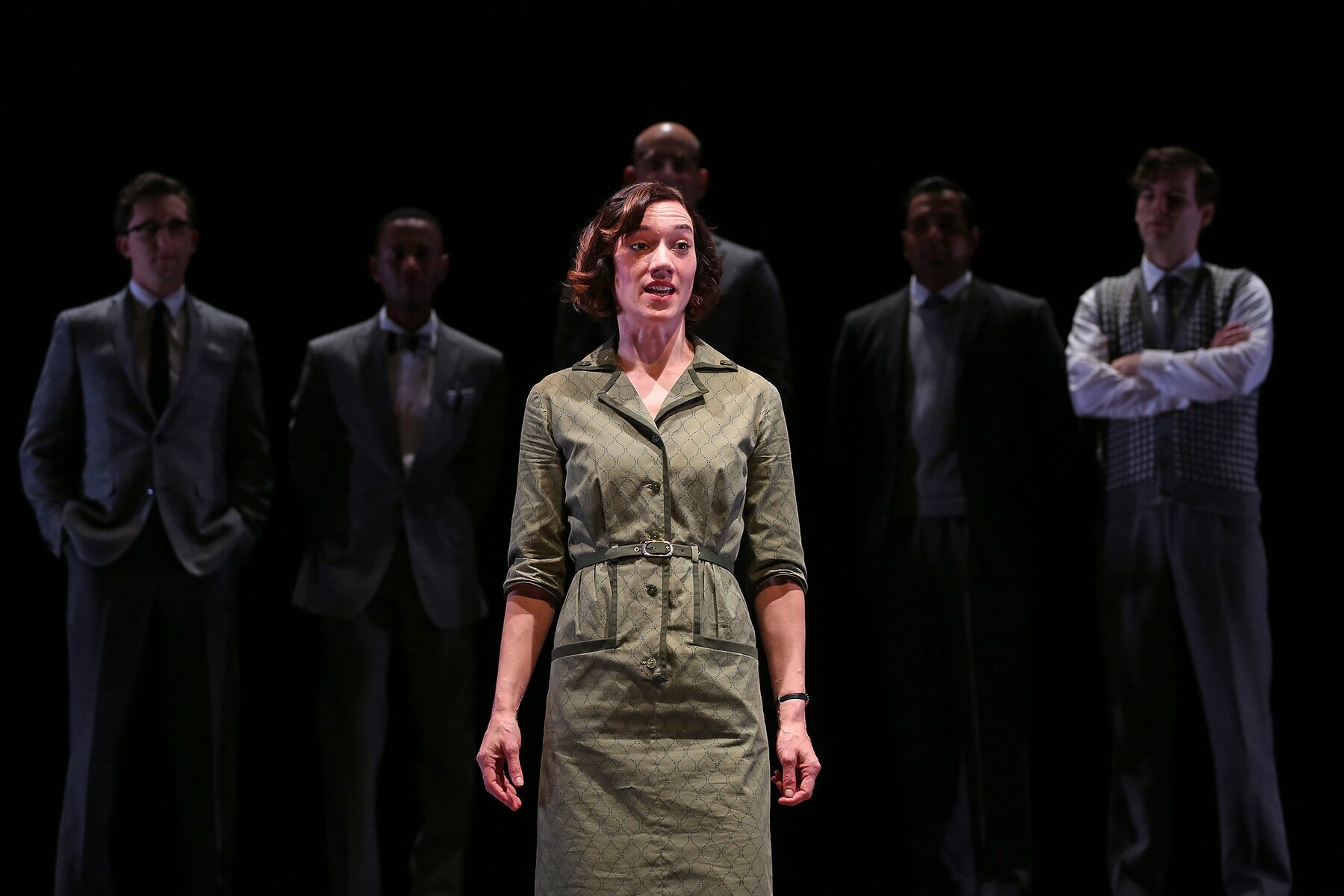 The company of Photograph 51 lined up in dark suits