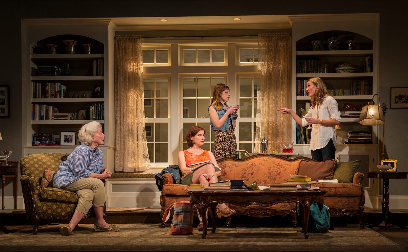 Three of the actors in Rapture, Blister, Burn in the living-room set