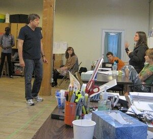 Kimberly Senior directing an actor across the rehearsal room floor for Waiting for Lefty