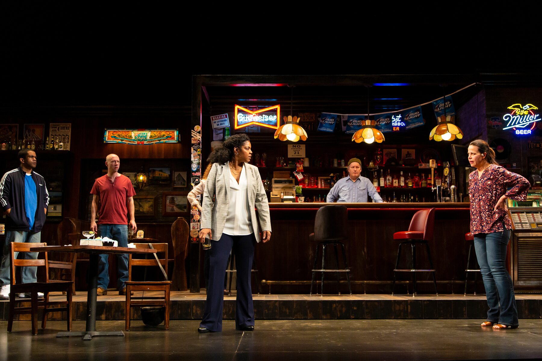 The full company on the bar set of Sweat at Huntington Theatre Company, directed by Kimberly Senior