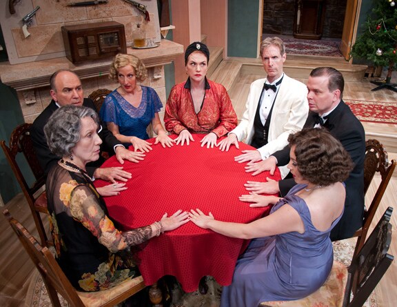 Two of the cast striking Sherlock Holmes poses in the castle drawing room
