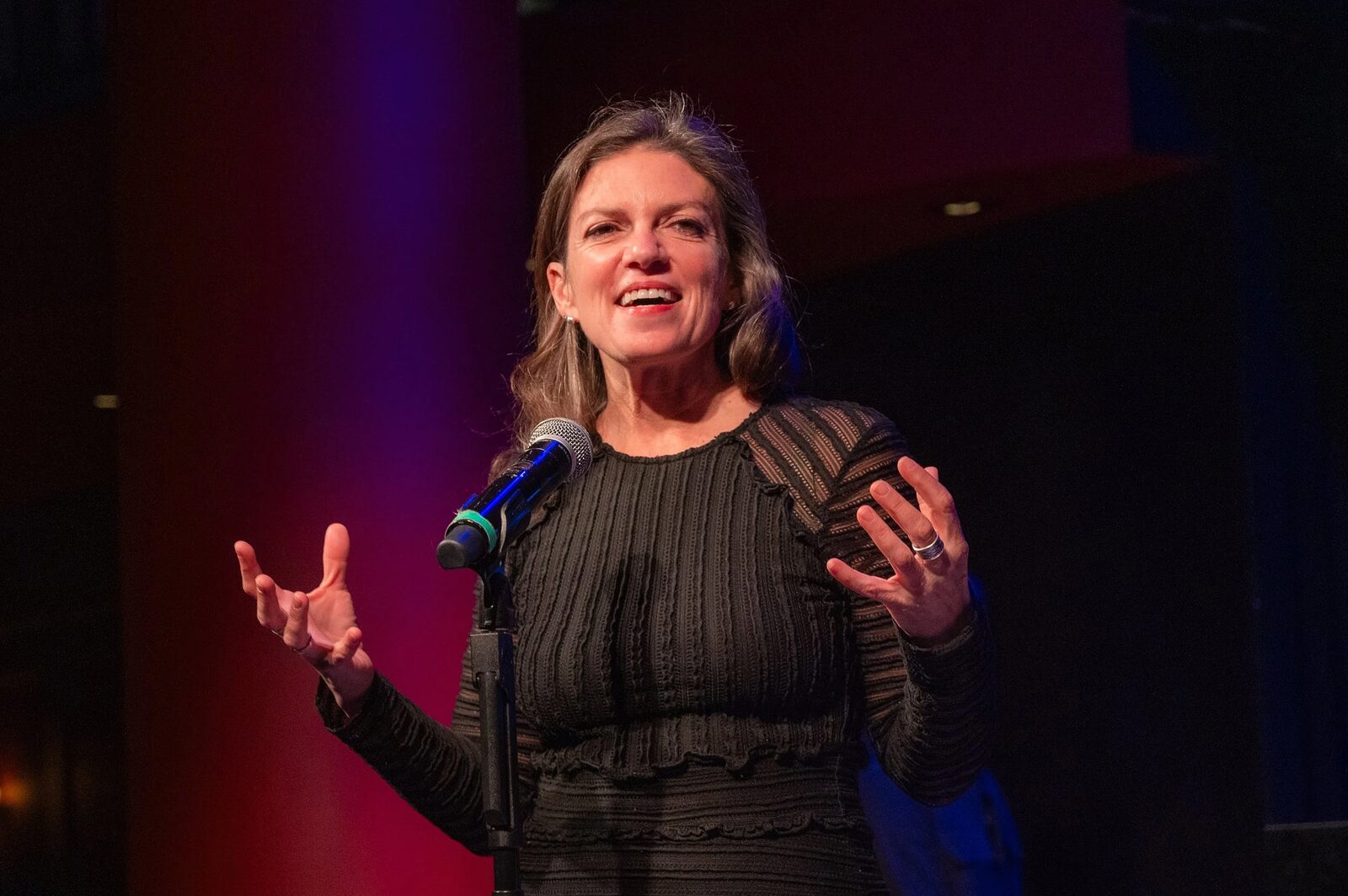 Kimberly Senior speaking at a microphone at the Primary Stages Variety Show benefit, 2026